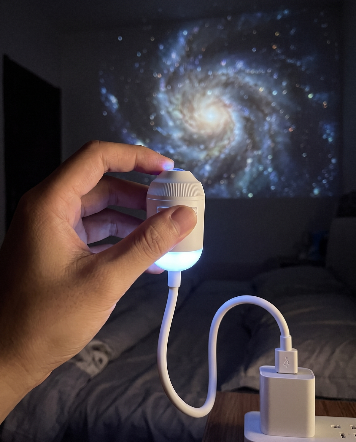 On tourne le haut de la tête du projecteur pour rendre l'image nette